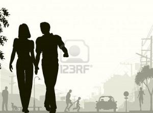couple walking down street